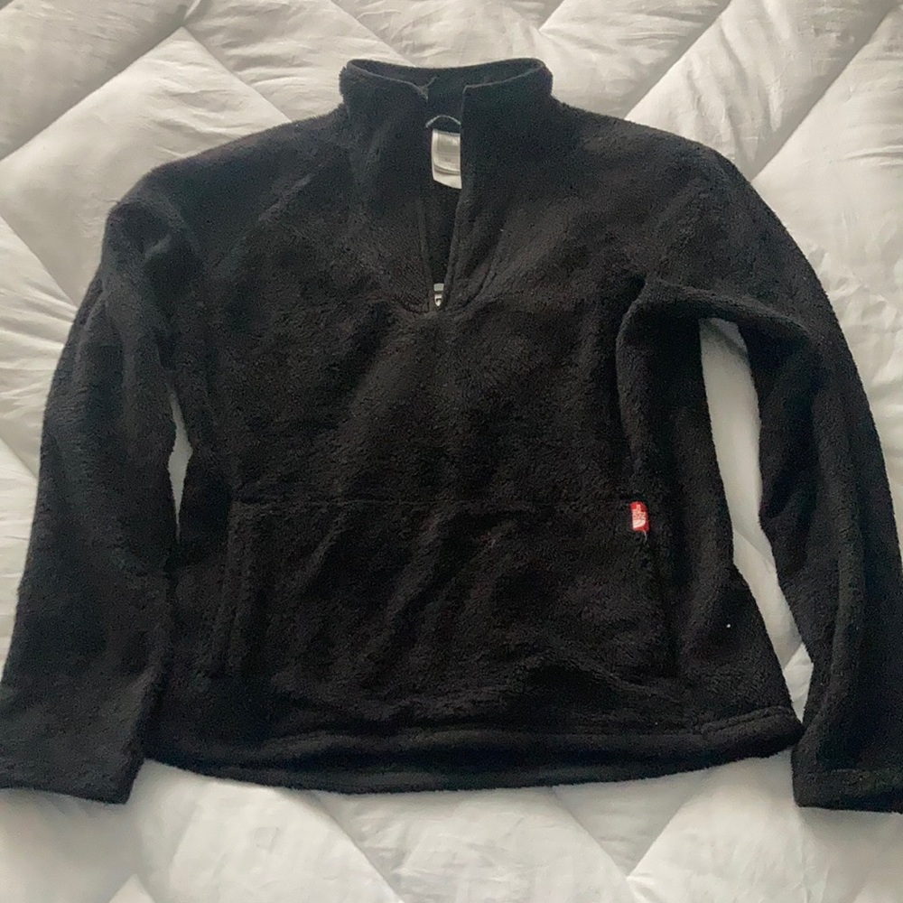 Woman’s black fleece north face jacket